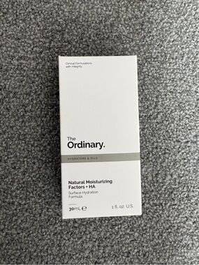 The Ordinary white box with gray band
